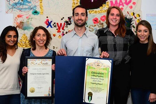 Law clinic director Nina Rabin (second from left) and colleagues