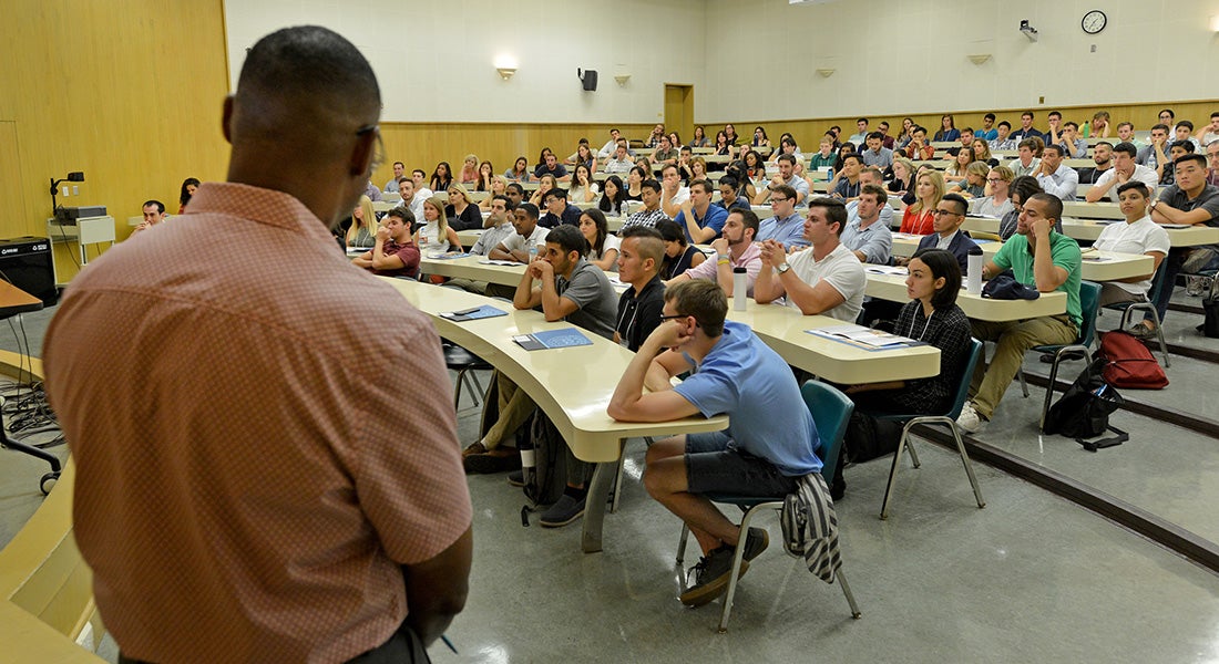 UCLA Law School classroom with a standing instructor facing seated students.