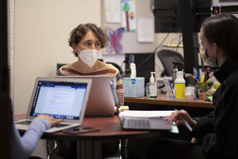 Afghan mini-clinic director Nina Rabin, advising students in her office in Fall 2021