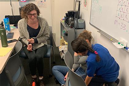 Lauren working with one of our young clients in the clinic’s office.