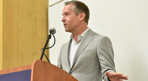 Kal Raustiala at speaker podium